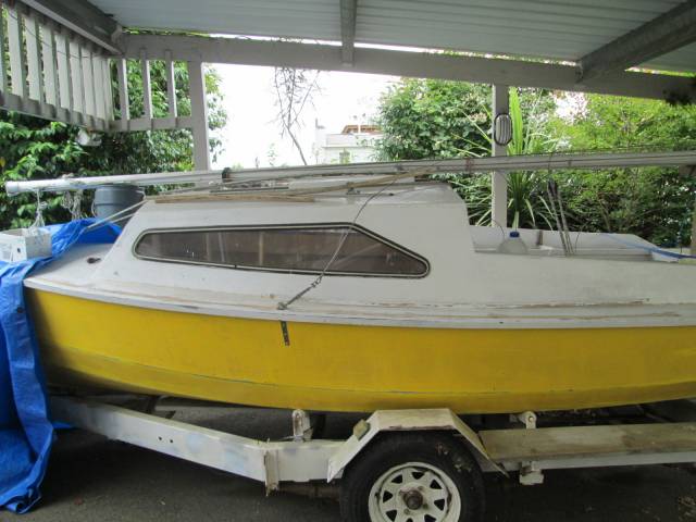 boat upside down on lawn